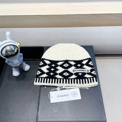 BONNET EN LAINE MÉLANGÉE NOIRE ET BLANC 431697 