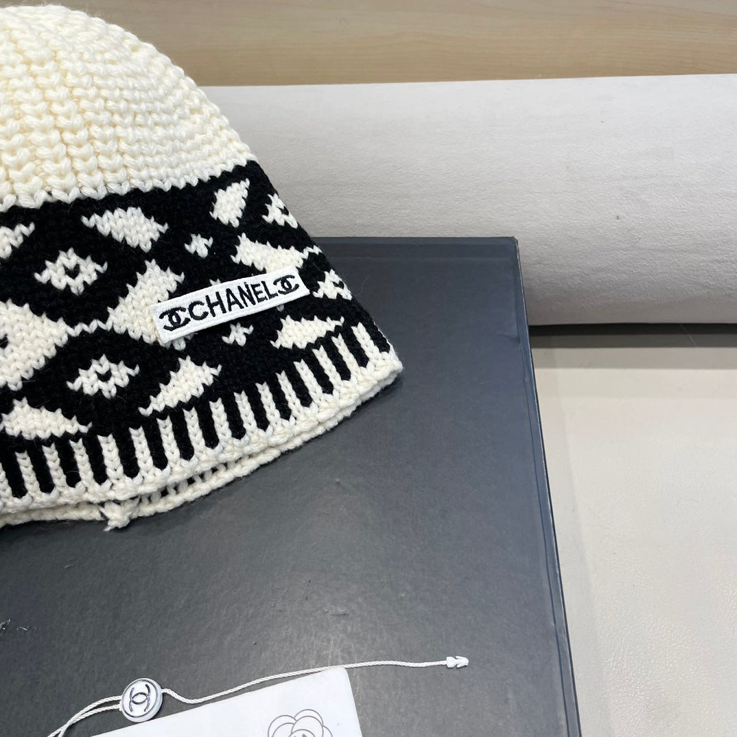 BONNET EN LAINE MÉLANGÉE NOIRE ET BLANC 431697 