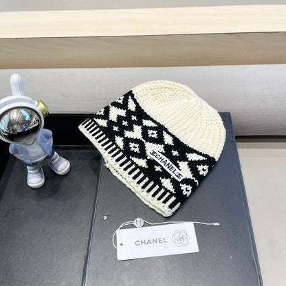 BONNET EN LAINE MÉLANGÉE NOIRE ET BLANC 431697 