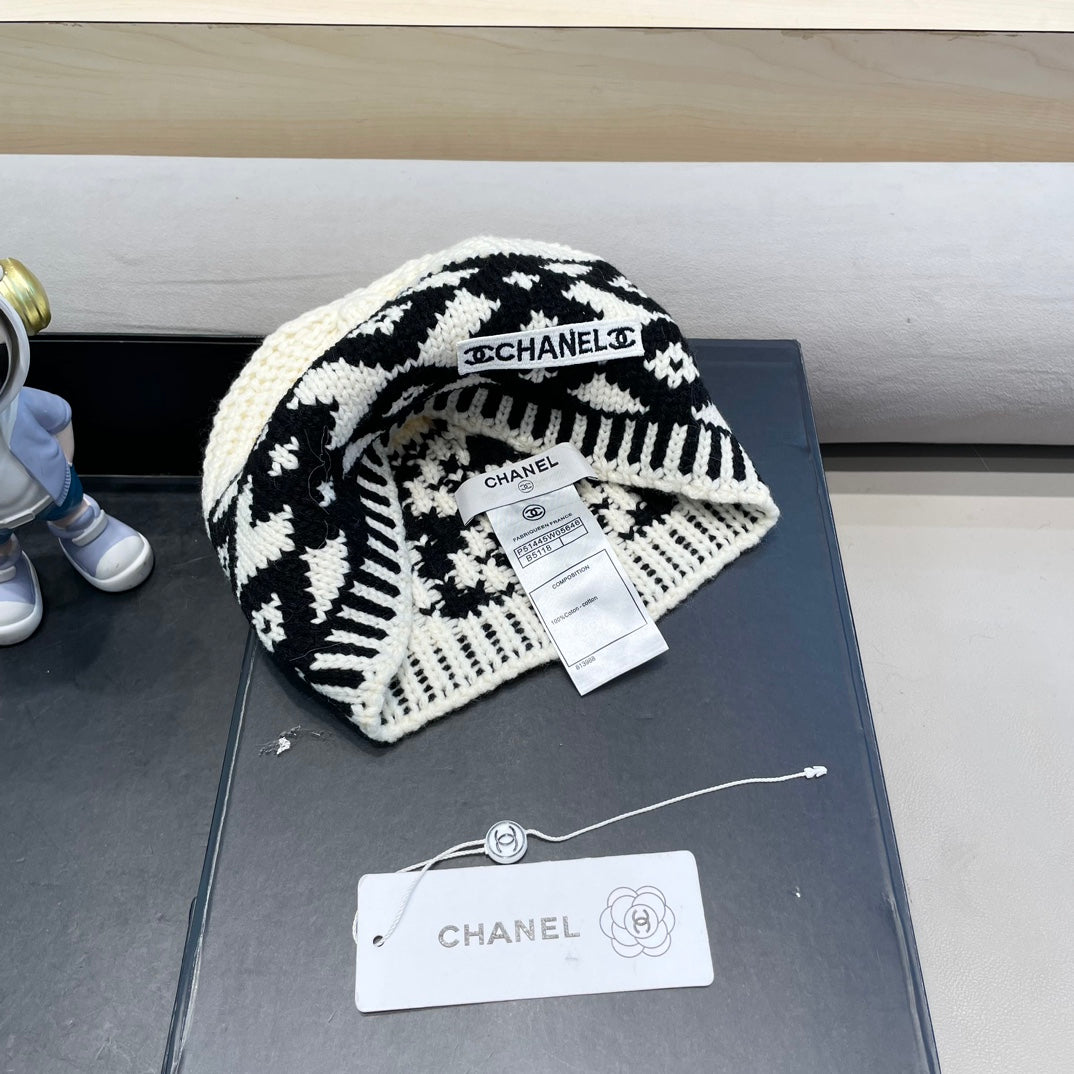 BONNET EN LAINE MÉLANGÉE NOIRE ET BLANC 431697 