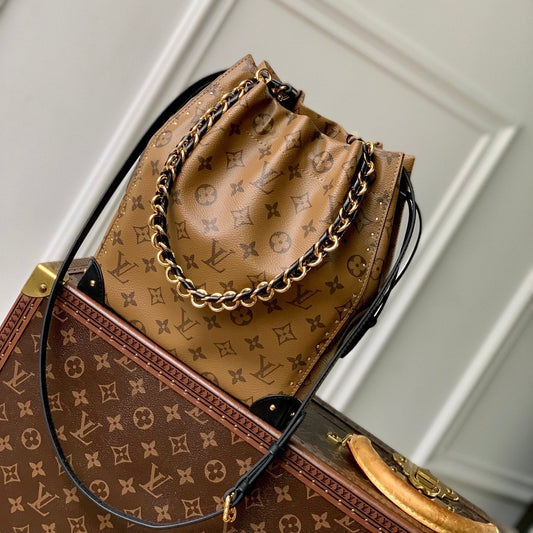 NO¨¦ TRUNK 23 IN BROWN MONOGRAM REVERSE CANVAS GOLD HARDWARE