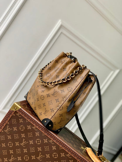 NO¨¦ TRUNK 23 IN BROWN MONOGRAM REVERSE CANVAS GOLD HARDWARE