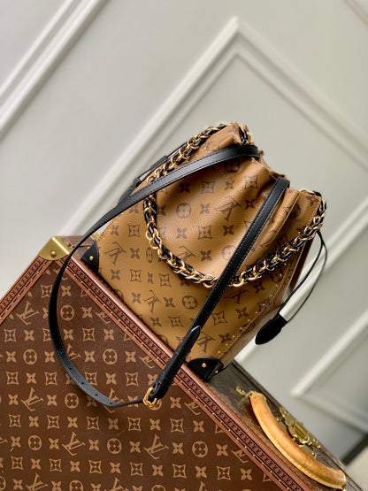 NO¨¦ TRUNK 23 IN BROWN MONOGRAM REVERSE CANVAS GOLD HARDWARE