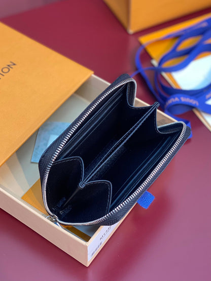 Monedero Zippy LV x TM de lona negra con monograma multicolor