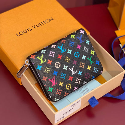 Monedero Zippy LV x TM de lona negra con monograma multicolor