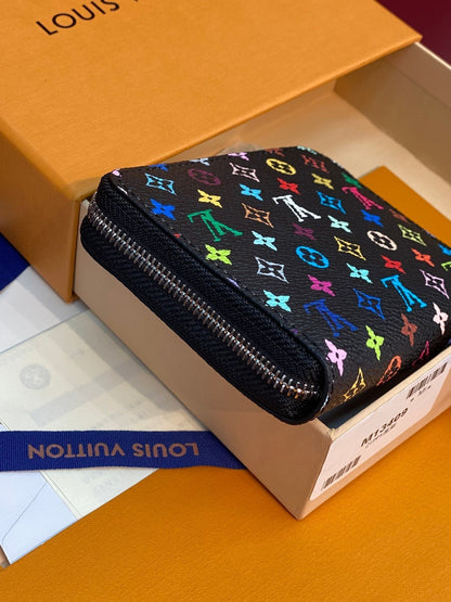 Monedero Zippy LV x TM de lona negra con monograma multicolor