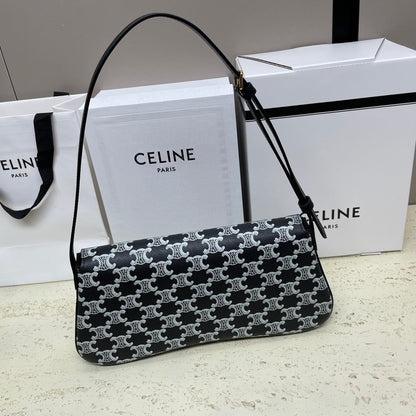 SAC LOLA BAGUETTE 28 EN TOILE MONOGRAMME NOIRE ET BLANC ET CUIR DE VEAU