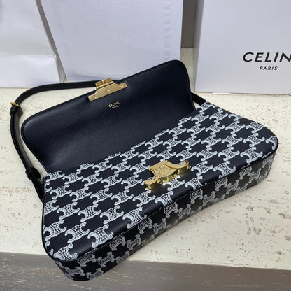 SAC LOLA BAGUETTE 28 EN TOILE MONOGRAMME NOIRE ET BLANC ET CUIR DE VEAU