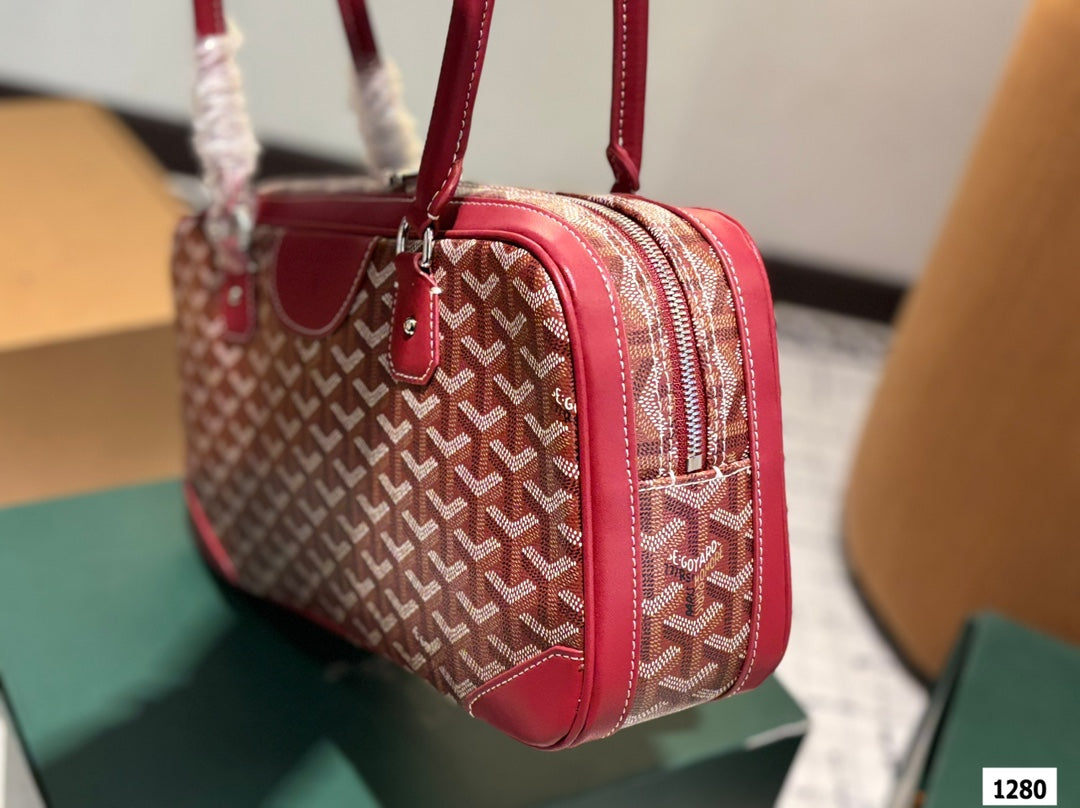 SAC SAINT MARTIN 35 EN TOILE GOYARDINE ROUGE BORDEAUX ET CUIR DE VEAU