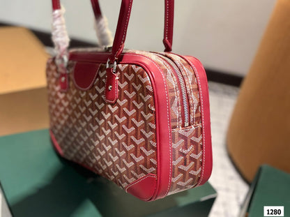 SAC SAINT MARTIN 35 EN TOILE GOYARDINE ROUGE BORDEAUX ET CUIR DE VEAU