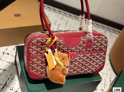 SAC SAINT MARTIN 35 EN TOILE GOYARDINE ROUGE BORDEAUX ET CUIR DE VEAU