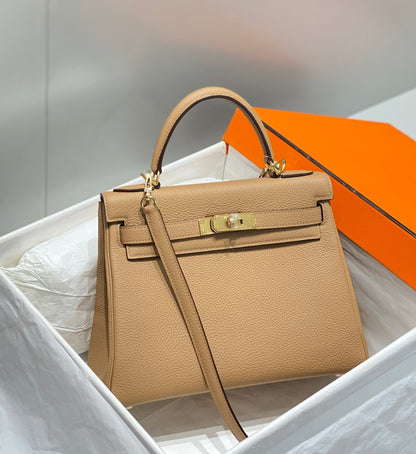 HM KELLY 28 CM BEIGE TOGO HARDWARE DORADO