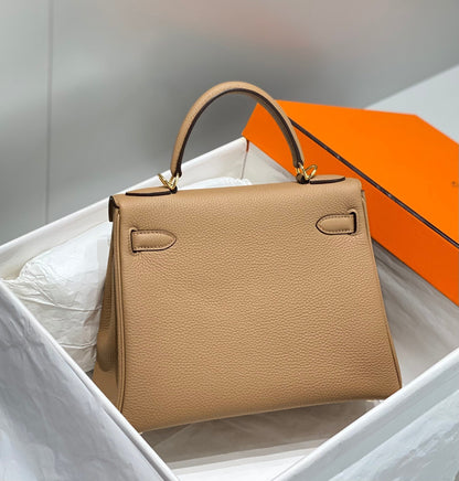 HM KELLY 28 CM BEIGE TOGO HARDWARE DORADO