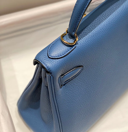 HM KELLY 28 CM AZUL TOGO HARDWARE DORADO