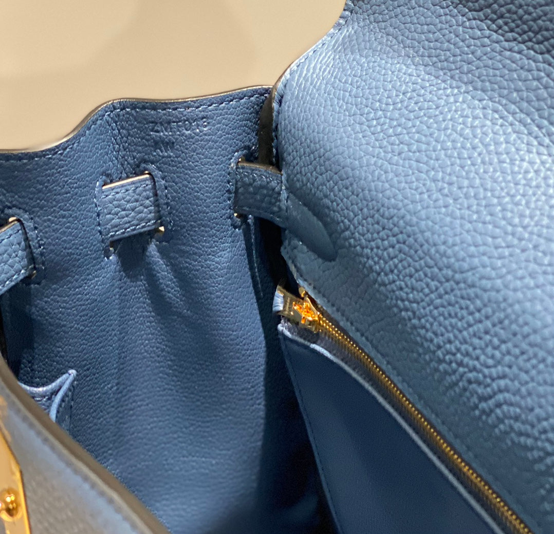 HM KELLY 28 CM AZUL TOGO HARDWARE DORADO