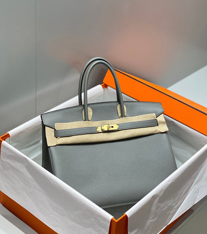 HM BIRKIN 35 CM MEDIANO GRIS TOGO PIEL HIERROS DORADOS