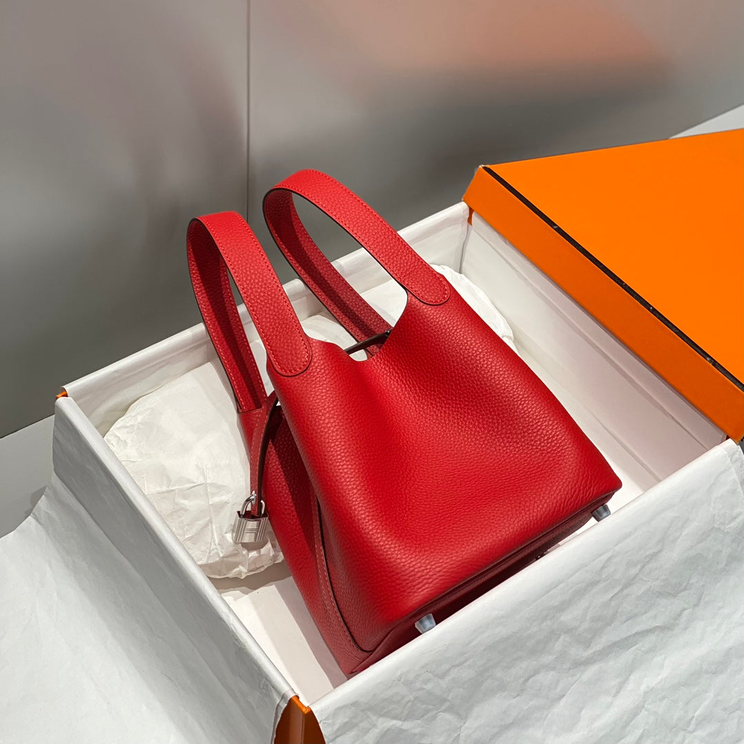 Cerradura picotin, cuero Togo rojo, herrajes plateados