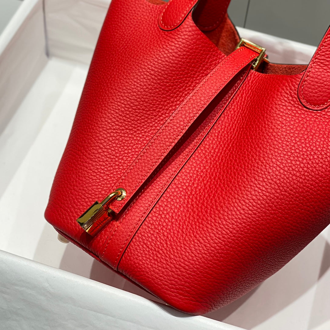 Cerradura de picotina, cuero Togo rojo, herrajes dorados