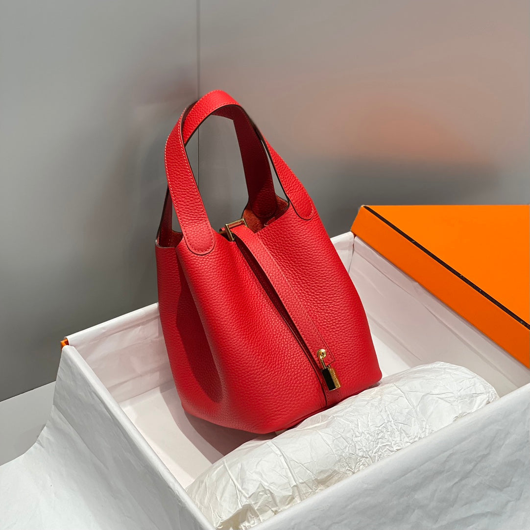 Cerradura de picotina, cuero Togo rojo, herrajes dorados