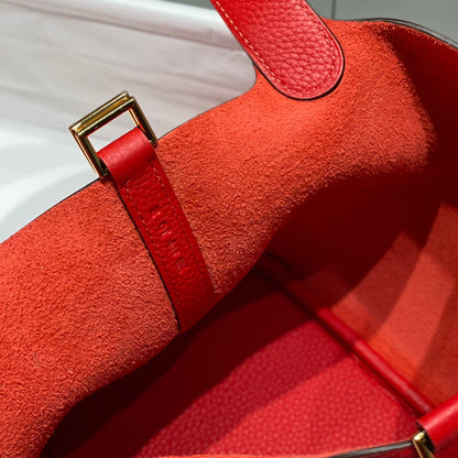Cerradura de picotina, cuero Togo rojo, herrajes dorados