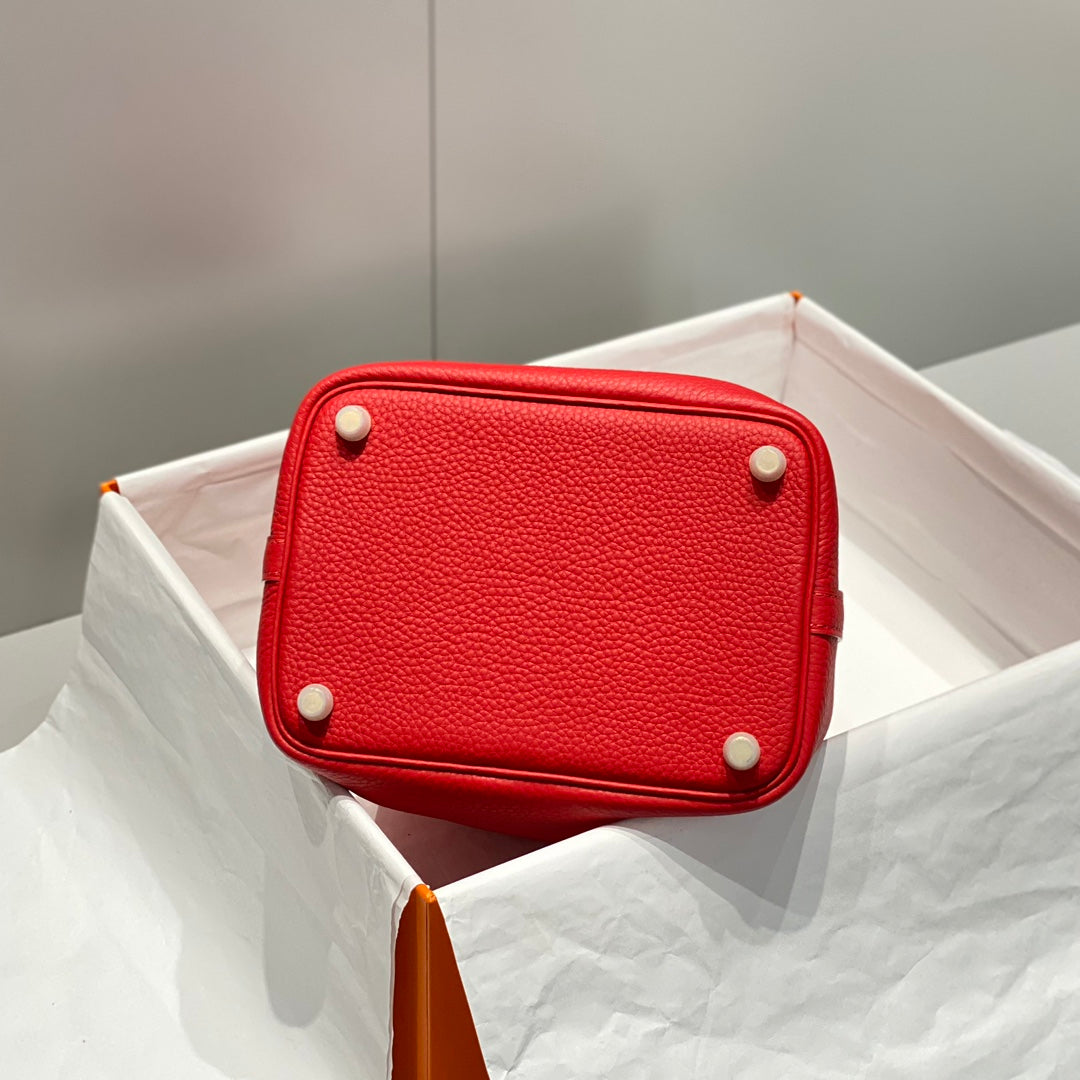 Cerradura de picotina, cuero Togo rojo, herrajes dorados