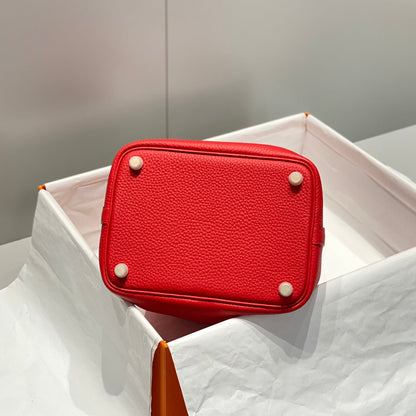 Cerradura de picotina, cuero Togo rojo, herrajes dorados