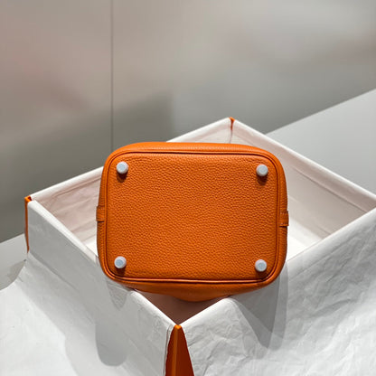 Cerradura de picotina, color naranja oscuro, cuero Togo, herrajes dorados