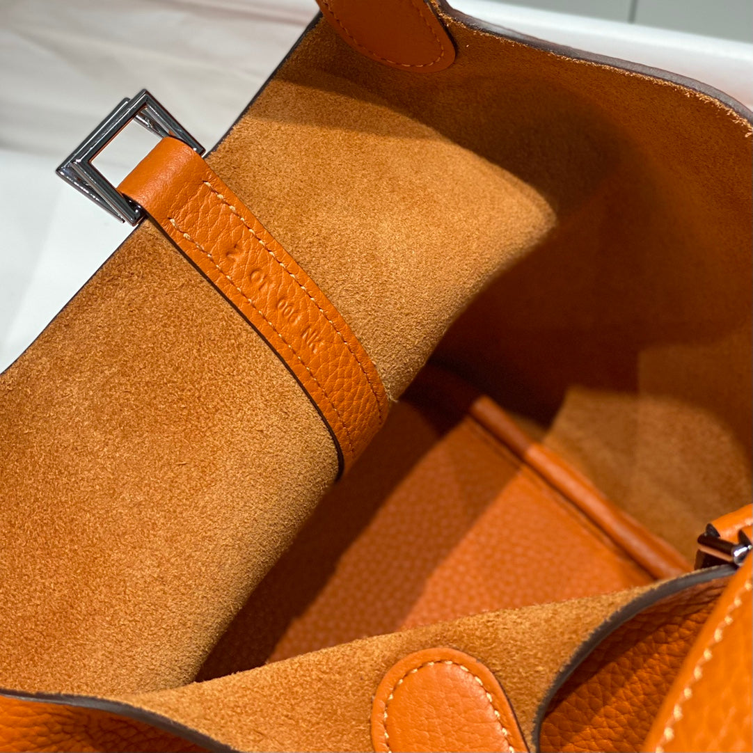 Cerradura de picotina, color naranja oscuro, cuero Togo, herrajes dorados