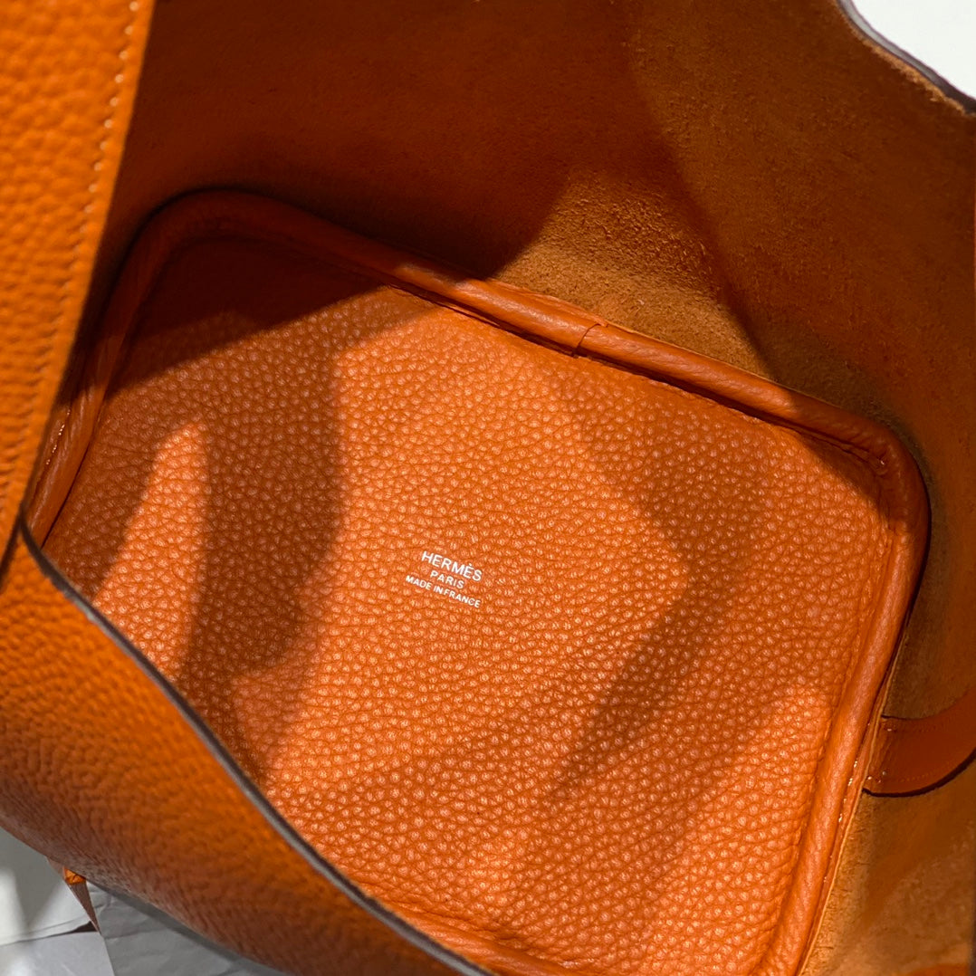 Cerradura de picotina, color naranja oscuro, cuero Togo, herrajes dorados