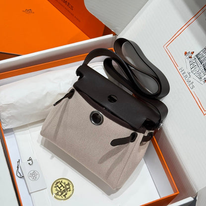 HM Mini Herbag Silver Buckle 20 Lona beige y piel de vacuno Hunter 243241