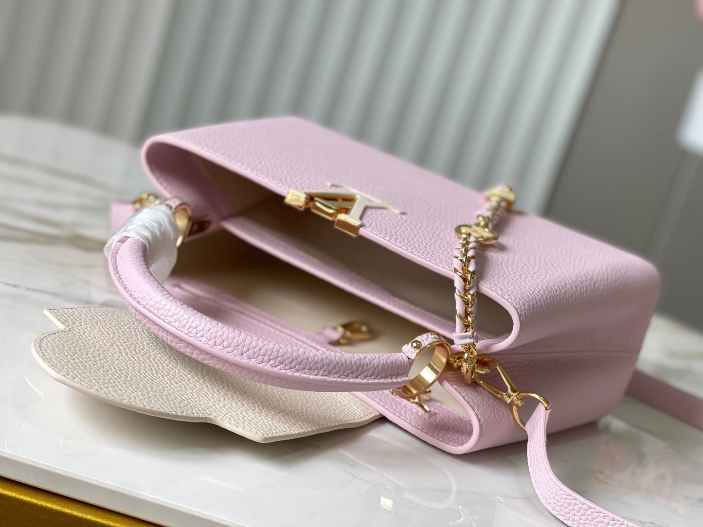 Capucines mm 31,5 piel taurillon rosa con herrajes dorados