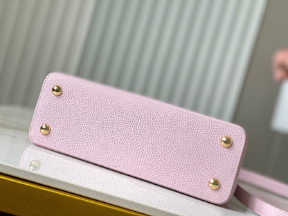 Capucines mm 31,5 piel taurillon rosa con herrajes dorados