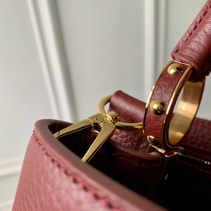 CAPUCINES BB 27 BURGUNDY TAURILLON MOP GOLD HARDWARE