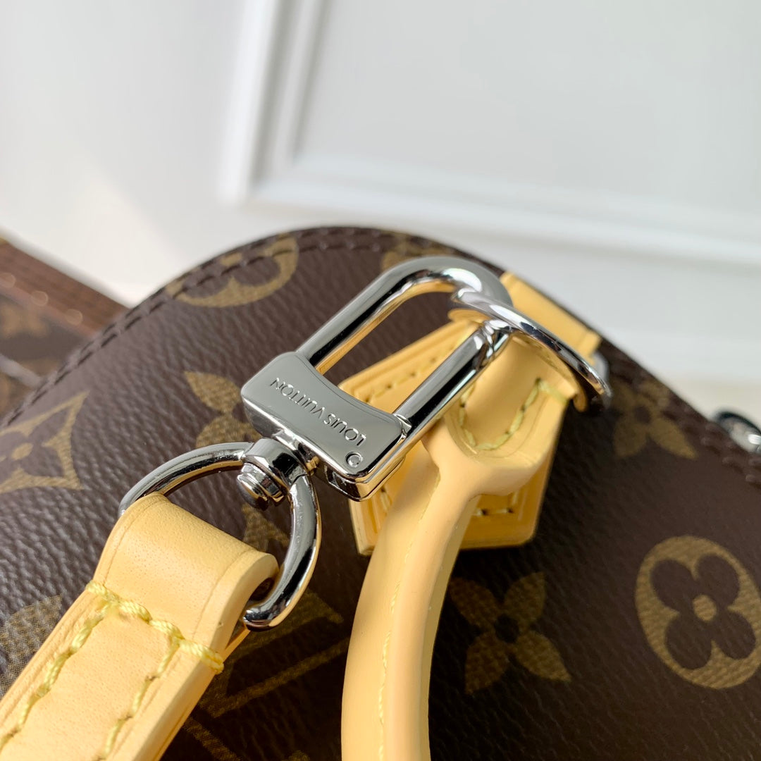Alma Nano 18 Monogram Canvas, piel de becerro amarilla 