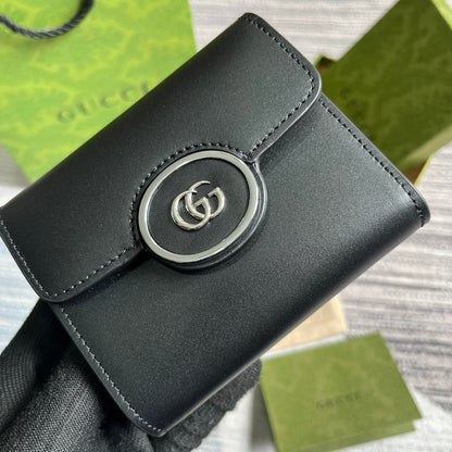 MINI CARTERA 11 EN PIEL DE BECERRO NEGRA