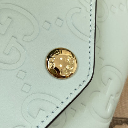 CARTERA CONTINENTAL 19 EN PIEL DE BECERRO REVESTIDA VERDE MENTA CON HERRAJES DORADOS