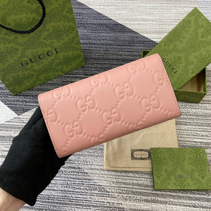 CARTERA CONTINENTAL 19 EN PIEL DE BECERRO REVESTIDA ROSA CON HERRAJES DORADOS