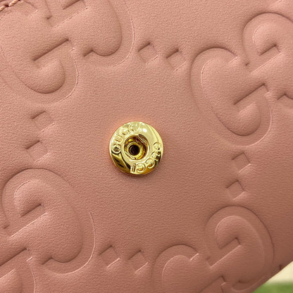 CARTERA CONTINENTAL 19 EN PIEL DE BECERRO REVESTIDA ROSA CON HERRAJES DORADOS