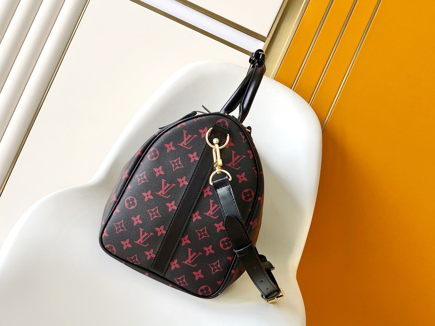 KEEPALL BANDOULI¨¨RE 45 EN LONA TOMETTE CON MONOGRAMA NEGRO