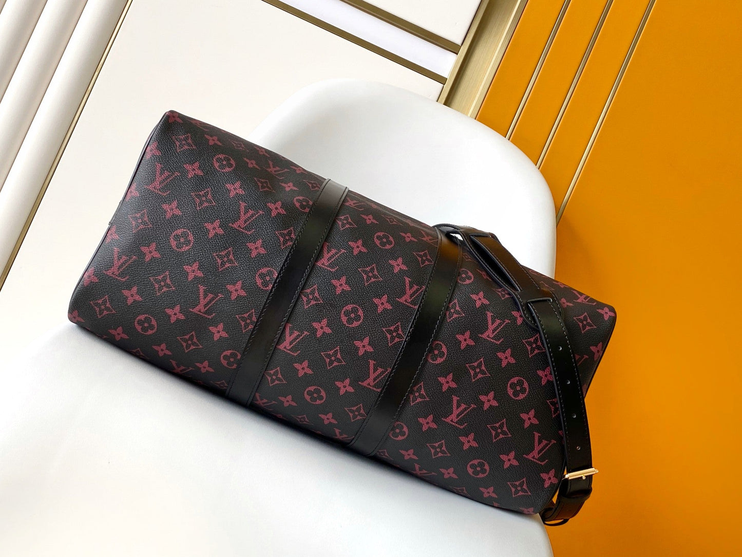 KEEPALL BANDOULI¨¨RE 45 EN LONA TOMETTE CON MONOGRAMA NEGRO