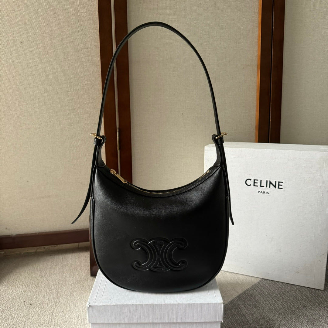 BOLSO PEQUEÑO HELOËSE CUIR 22 EN PIEL DE BECERRO NEGRA CON LOGOTIPO EN RELIEVE