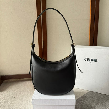 BOLSO PEQUEÑO HELOËSE CUIR 22 EN PIEL DE BECERRO NEGRA CON LOGOTIPO EN RELIEVE