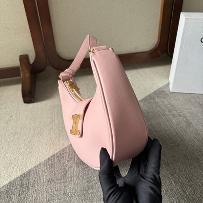 BOLSO MEDIANO AVA TRIOMPHE 23 EN PIEL DE BECERRO LISA ROSA CLARO CON HERRAJES DORADOS
