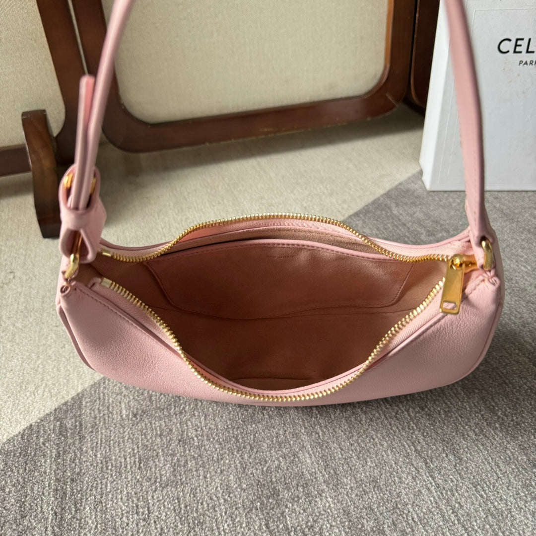 BOLSO MEDIANO AVA TRIOMPHE 23 EN PIEL DE BECERRO LISA ROSA CLARO CON HERRAJES DORADOS