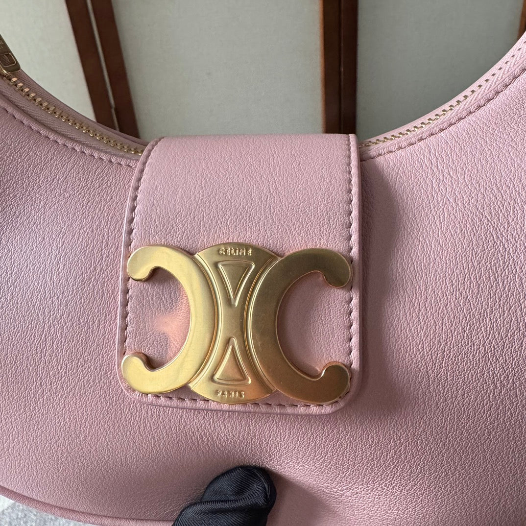 BOLSO MEDIANO AVA TRIOMPHE 23 EN PIEL DE BECERRO LISA ROSA CLARO CON HERRAJES DORADOS