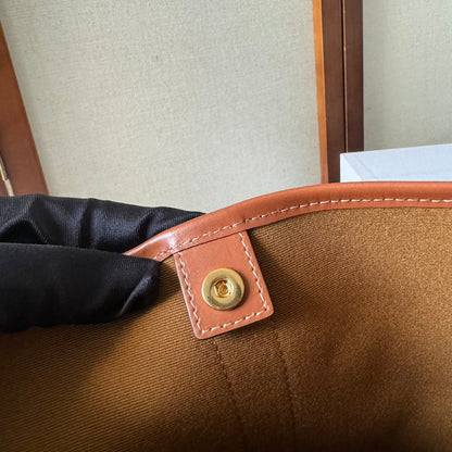 SEAU 30 EN TOILE TRIOMPHE BEIGE ET GARNITURES EN CUIR DE VEAU ROUGE MARRON