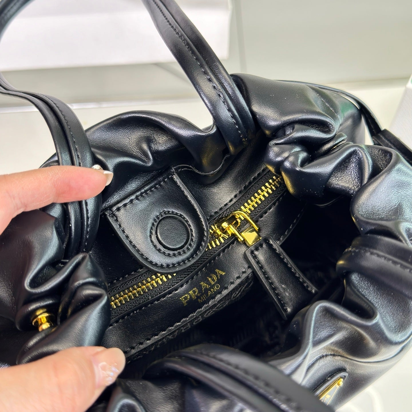 SAC SEAU À CORDON 25 EN CUIR D'AGNEAU SOUPLE NOIR
