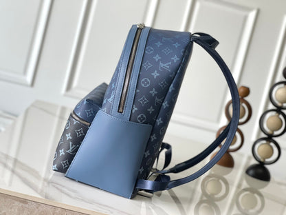 MOCHILA DISCOVERY PM 38 LONA DEGRADADA CON MONOGRAMA AZUL EGEO Y NEGRO