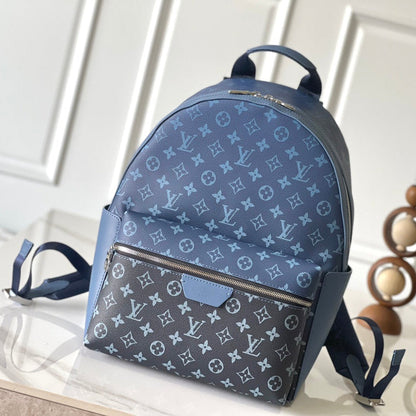 MOCHILA DISCOVERY PM 38 LONA DEGRADADA CON MONOGRAMA AZUL EGEO Y NEGRO