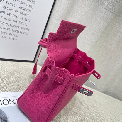 Sac HM Kelly 25 cm en cuir rose du Mexique Togo avec accessoires dorés